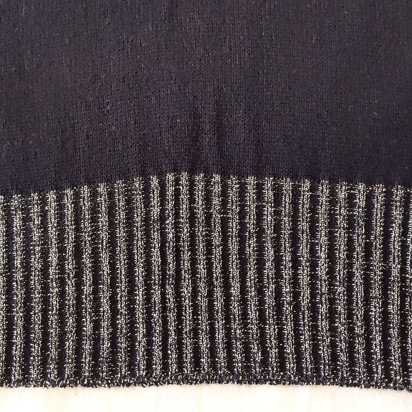 Woman's sweater top and skirt set with sparkling shoulders and trim. - Picture 4 of 5